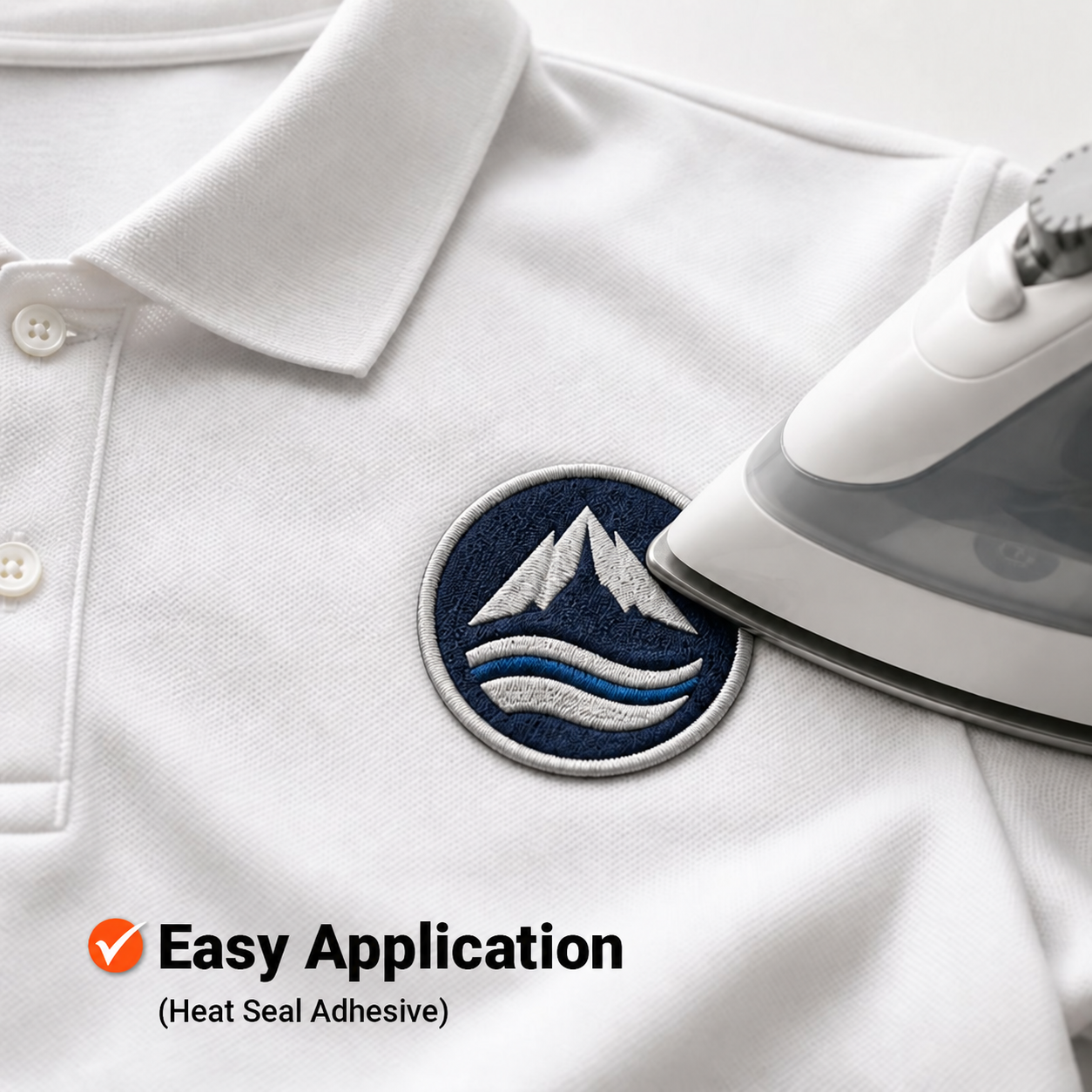 Custom embroidered iron-on patches applied to apparel